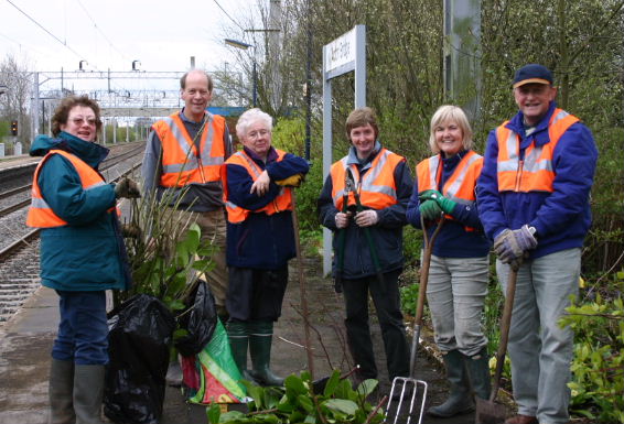 WI Gardeners on Acton Bridge Station - April 2005